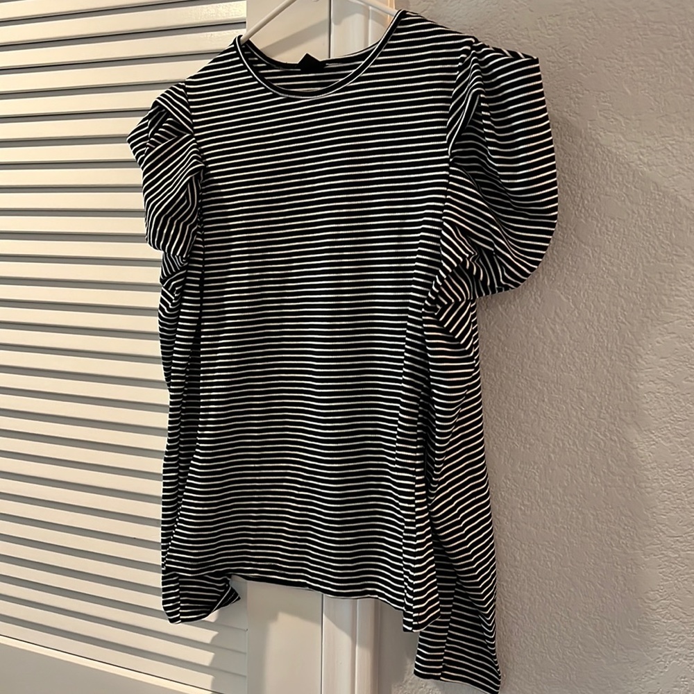 Puffy sleeved top brand new.